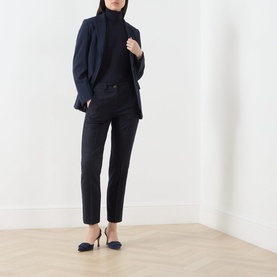 Model wearing Marella Macina Straight Leg Trousers in Navy Plain with straight-cut legs and pressed creases, styled with navy blazer and heels.