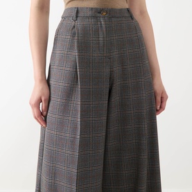 Model wearing Marella Carena Prince of Wales Wide Leg Trousers in grey check, styled with a beige top, showing wide-leg silhouette and pressed