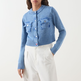 Model wearing Max&Co Staffa Stone-Washed Cardigan in deep blue with snap buttons, chest pockets, and ribbed trims, styled with white wide-leg trousers