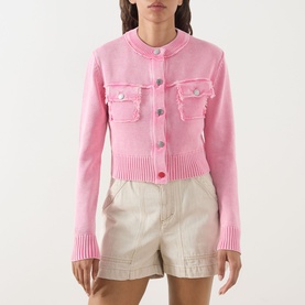 Model wearing Max&Co Staffa Stone-Washed Pink Cardigan with snap buttons, chest pockets, and ribbed trims, styled with cream shorts.