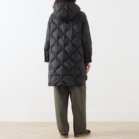 Model wearing Max&Co Vello Quilted Coat in black, rear view, showing onion quilting, hooded collar and midi length, styled with khaki trousers