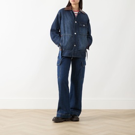 Model wearing Max&Co navy denim coat with brown leather collar, styled with matching wide-leg denim trousers and black shoes