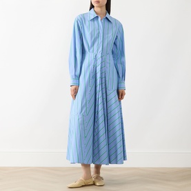 Model wearing Max&Co Ritmo Stripe Shirt Dress in light blue cotton with pointed collar, long sleeves, cinched waist and flared midi skirt