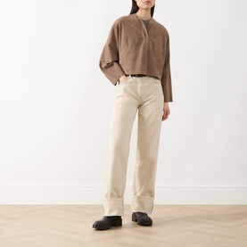 Model wearing Max&Co turtledove leather jacket with cropped boxy fit, styled with cream wide-leg trousers and black loafers.