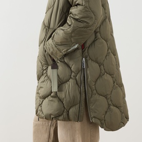 Max&Co Vello Quilted Coat in kaki, showing onion quilting detail, silver two-way zip, and front welt pocket at hip