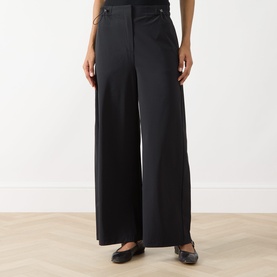 Model wearing Max&Co Orche Technical Straight Leg Trousers in black, wide-leg silhouette, paired with black ballet flats
