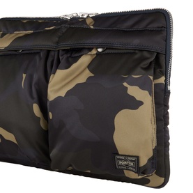 Porter Yoshida Counter Shade Laptop Case in woodland khaki camo-print nylon with silver-tone hardware, zipped exterior pockets and logo badge