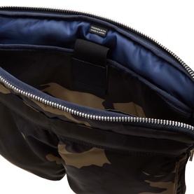 Porter Yoshida Counter Shade Laptop Case in woodland khaki camo nylon, open to reveal navy blue interior lining with silver-tone zip