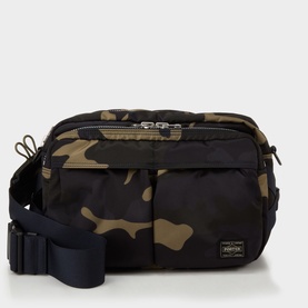 Porter Yoshida bag in Woodland Khaki camo print, black hardware and adjustable crossbody strap, two front zip pockets