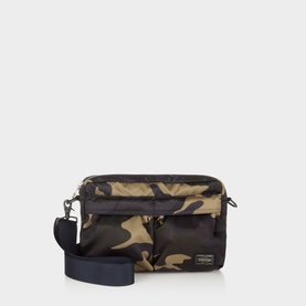 Porter Yoshida Counter Shade Shoulder Bag in Woodland Khaki camo nylon, zip fastening, exterior zip pockets, navy adjustable crossbody strap,
