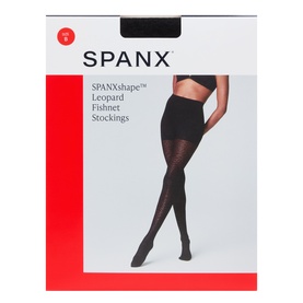 Spanx SPANXshape Leopard Fishnet Stockings in Very Black, shown on packaging with model wearing the tights
