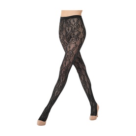 Model wearing Wolford black floral lace tights with allover pattern, shown from waist to foot on bare legs