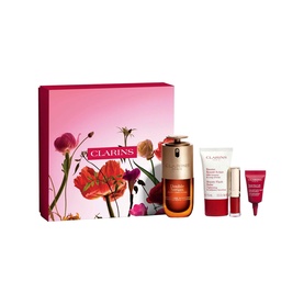Clarins skincare gift set with serum, moisturiser, lip colour and eye cream in branded red floral box