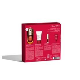 Clarins skincare value set in red gift box, featuring serum, cream, and two travel-size extras