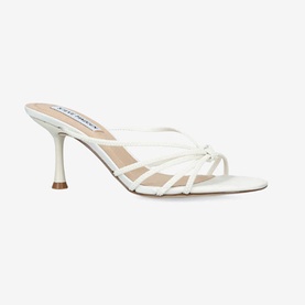 Steve Madden white strappy kitten heel mule sandals with knotted toe strap detail and slim flared heel, side view