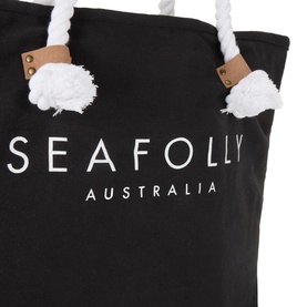 Seafolly Ship Sail Tote Bag in black cotton canvas, close-up of white rope handles with knot detail and contrast logo branding
