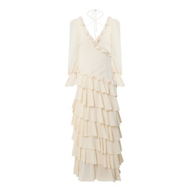 Anne Louise Boutique cream tiered ruffle maxi dress with wrap V-neckline, long sleeves, and halterneck tie back