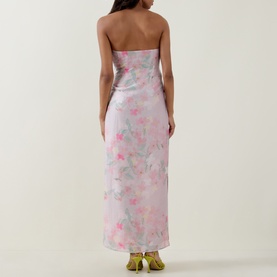 Model wearing Bernadette dress in Clematis Montana Pink floral print, strapless maxi silhouette, back view, styled with gold heeled mules