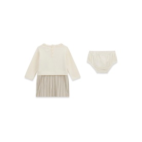 Cream and taupe baby dress with pleated skirt and matching bloomers, long sleeves, laid flat on white background