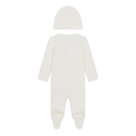 Cream knit baby sleepsuit and matching beanie hat set, displayed flat showing back view with footed bottom