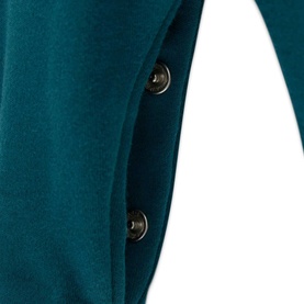 Guess Green Tree romper close-up showing dark gunmetal button placket detail on teal-green fabric
