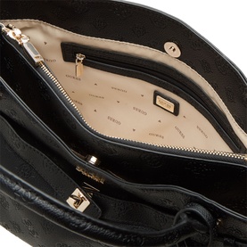 Guess black logo satchel open interior view, cream monogram lining, zip pocket, gold-tone hardware and logo plaque visible