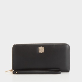 Guess black zip-around wallet with gold-tone logo clasp and detachable wrist strap, smooth faux leather finish