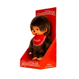 Monchhichi plush toy in branded red display box, brown monkey character with red checked bib, medium size