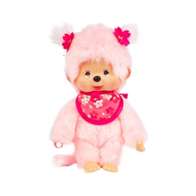 Monchhichi pink plush toy with floral bib, pink ear tufts, and flower hair clips, seated pose