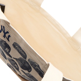 New Era New York Yankees MLB Cap Graphic Tote Bag in beige cotton canvas, showing interior and Yankees cap array graphic lining detail.