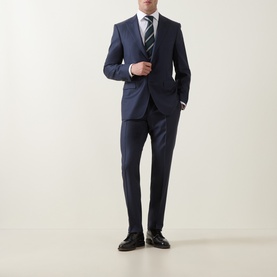 Model wearing Canali D8 Two-Piece Suit in navy wool, styled with white shirt, striped tie and black oxford shoes.