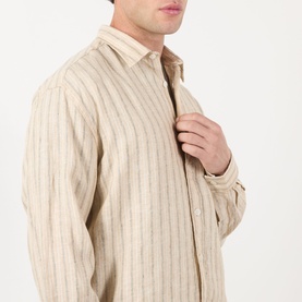 Model wearing NN07 Deon Linen Striped Shirt in Black Stripe, long sleeves, point collar, front button fastening, close-up side angle