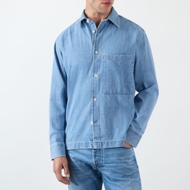 Model wearing NN07 Blue Denim casual shirt with chest patch pocket, button-front fastening, styled with blue jeans
