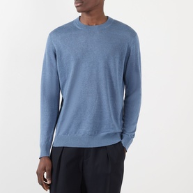 Model wearing NN07 Stone Blue linen crew neck jumper, styled with dark tailored trousers.