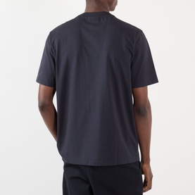 Model wearing NN07 Adam Rope Logo T-Shirt in Deep Navy, back view, crew neck, short sleeves, straight hem, smooth cotton finish.