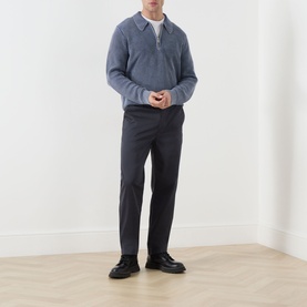 Model wearing Paige Eberton Tapered Leg Trousers in True Navy, styled with a grey half-zip knit and black chunky loafers