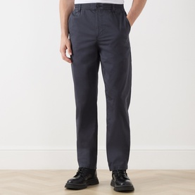 Model wearing Paige Eberton Tapered Leg Trousers in True Navy, styled with black leather shoes. Regular fit with elasticated waistband.