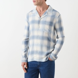 Model wearing Paige Kransey Check Casual Shirt in Shadow Plaid, blue and cream check, revere collar, long sleeves, styled with blue jeans