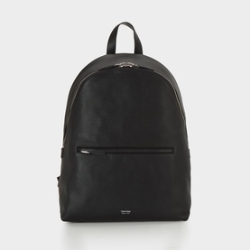 Tom Ford black leather backpack with silver-tone zip, front slip pocket, top carry handle, and adjustable shoulder straps