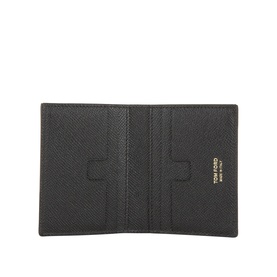 Tom Ford black leather cardholder open flat, showing interior card slots and gold logo lettering