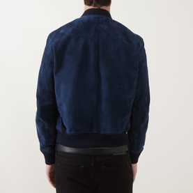 Model wearing Tom Ford indigo suede casual jacket, back view, with black ribbed hem and cuffs
