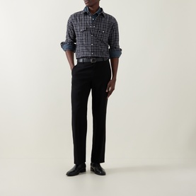 Model wearing Tom Ford grey cotton check casual shirt, styled with black trousers and leather belt
