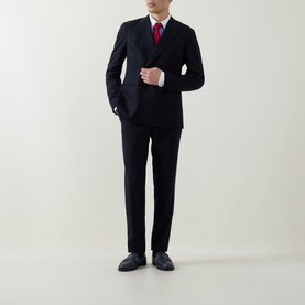 Model wearing Tom Ford Stripe Contrast Shirt in combo blue and white, styled with navy double-breasted suit, red tie and black loafers.