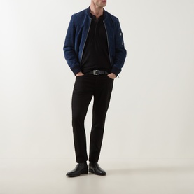 Model wearing Tom Ford black wool-silk-cashmere T-shirt, styled with navy bomber jacket, black slim trousers and black leather shoes.