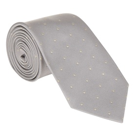 Silver silk tie with small cream polka dot pattern, rolled to display fabric texture and width