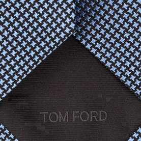 Tom Ford blue and black houndstooth silk tie, reverse showing Tom Ford logo on dark lining