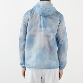 Model wearing 247 Casual Jacket in Glacier Fade Out, rear view, light blue cloud-dye print, mesh texture, hooded, with white shorts