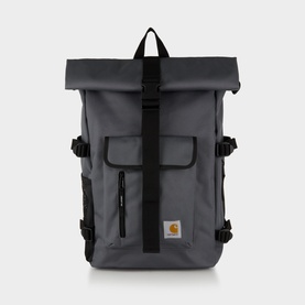 Carhartt Philis Logo Backpack in Styx grey, roll-top with black buckle straps, front flap pocket and gold logo patch
