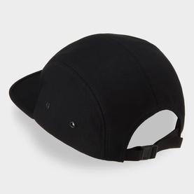 Carhartt Backley Logo Cap in black, five-panel style with firm flat peak, metal eyelets, and adjustable back strap. Rear view.