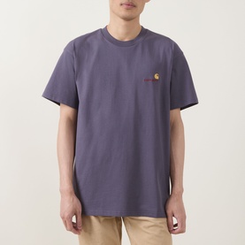 Model wearing Carhartt American Script Logo T-Shirt in Shady Purple, crew neck, short sleeves, with small chest logo embroidery.